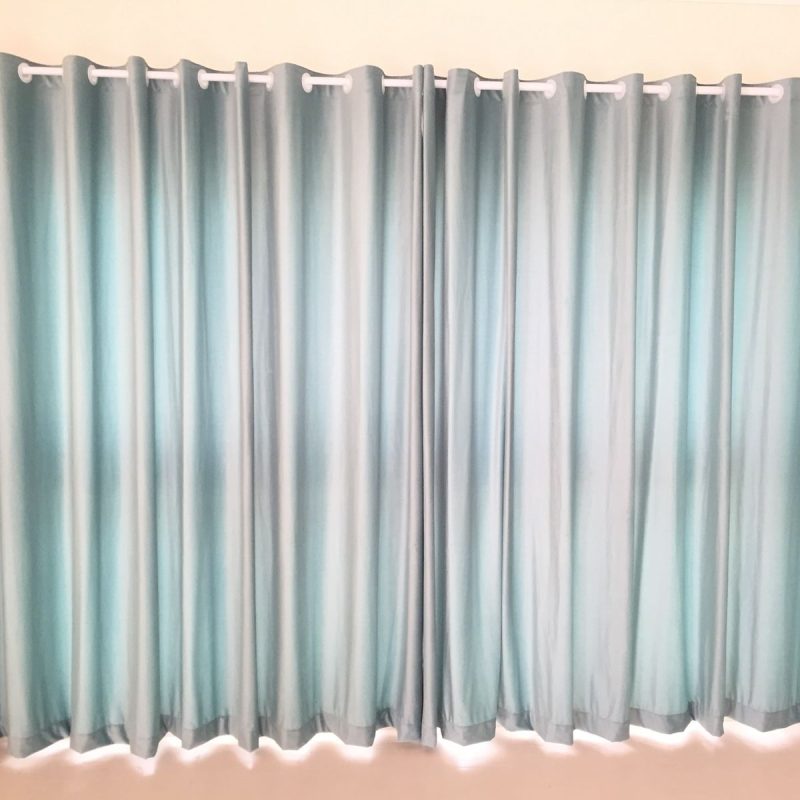 Eyelet curtains in Dubai with modern wave folds and elegant fabric design